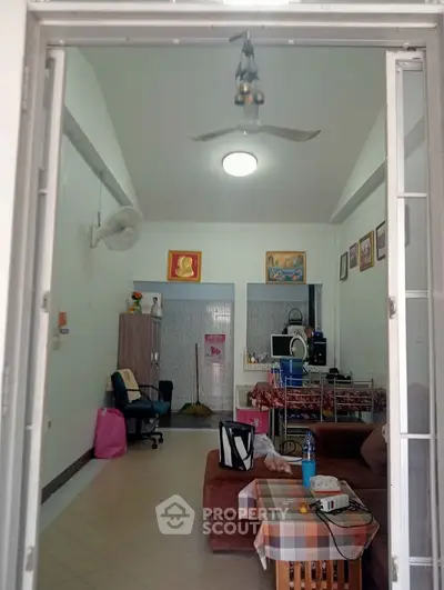 Cozy living room with modern decor and open layout, perfect for relaxation and entertainment.