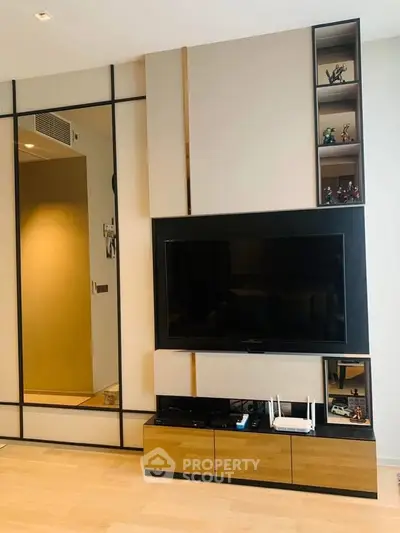 Modern living room with sleek TV unit and stylish decor