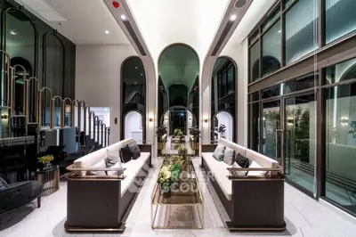 Luxurious modern living room with high ceilings and elegant decor