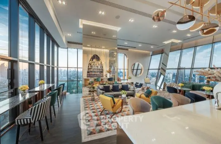 Luxurious high-rise living room with panoramic city views and stylish decor.