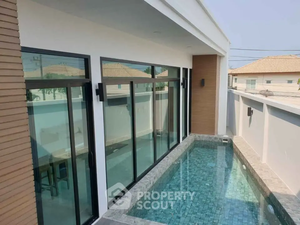 Luxurious modern home with private pool and sleek design