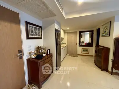 Elegant apartment interior with stylish furniture and modern kitchen appliances.