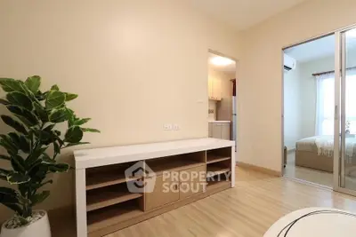 Modern apartment interior with wooden flooring and stylish furniture