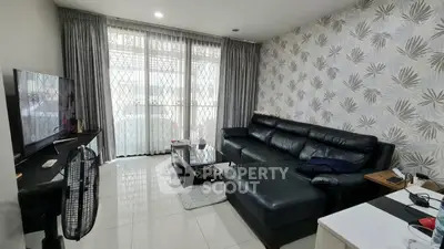 Stylish living room with modern decor and large leather sofa