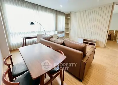 Spacious living room with modern furniture and natural light