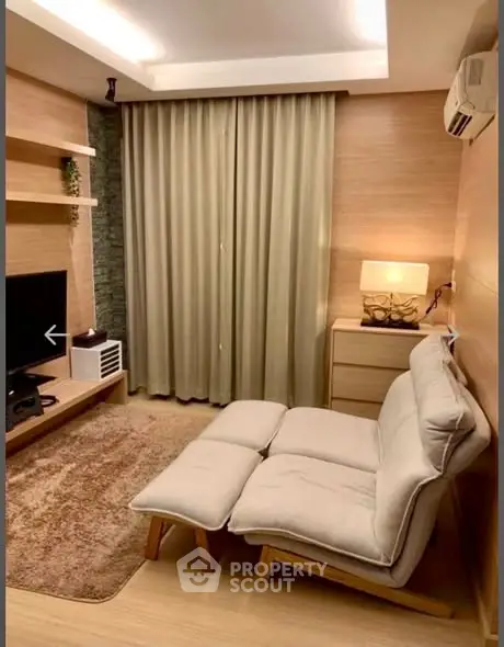 Cozy living room with modern decor and comfortable seating