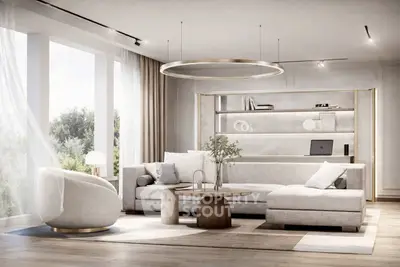 Luxurious modern living room with elegant furniture and large windows offering natural light.