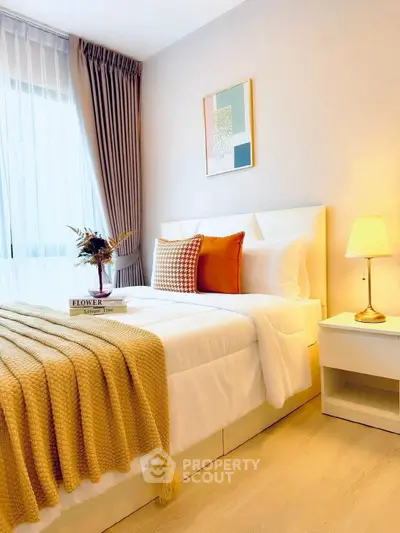 Cozy and stylish bedroom with modern decor and natural light