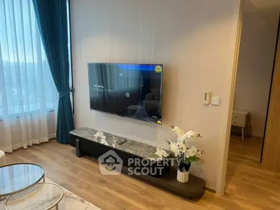 Modern living room with stylish TV setup and elegant decor