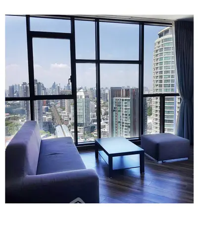 Modern living room with stunning city view from large windows
