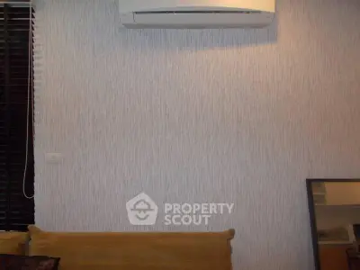 Modern living room with air conditioning and stylish decor