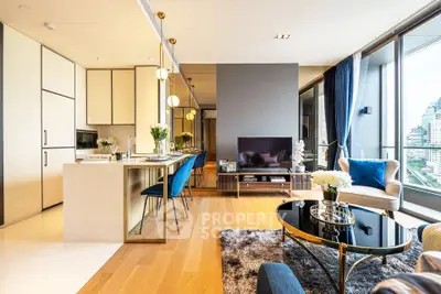 Luxurious modern living room with open kitchen and stunning city view