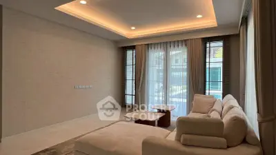 Modern living room with cozy sofa and stylish lighting