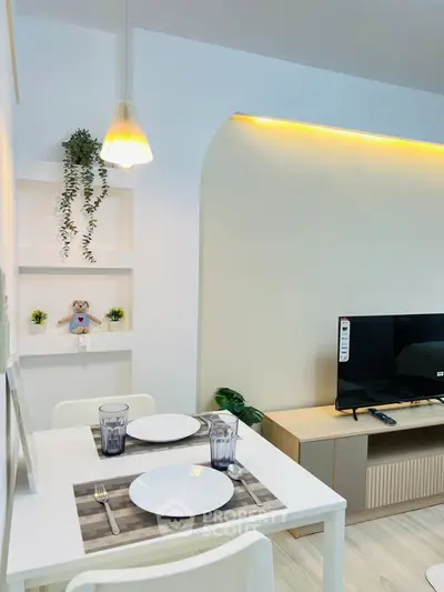 Modern living room with stylish decor and cozy dining area