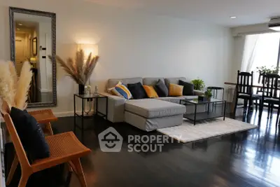 Spacious modern living room with stylish decor and natural light