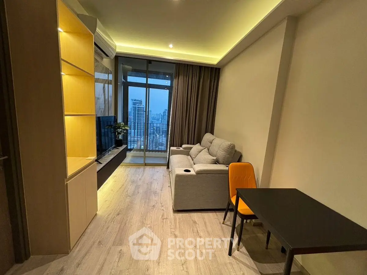 Modern living room with city view, cozy sofa, and sleek furniture design.