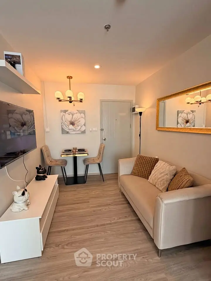 Cozy living room with modern decor and elegant lighting, perfect for relaxation and entertainment.