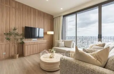 Spacious modern living room with large windows and city view