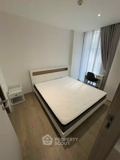 Modern bedroom with minimalist design and natural light