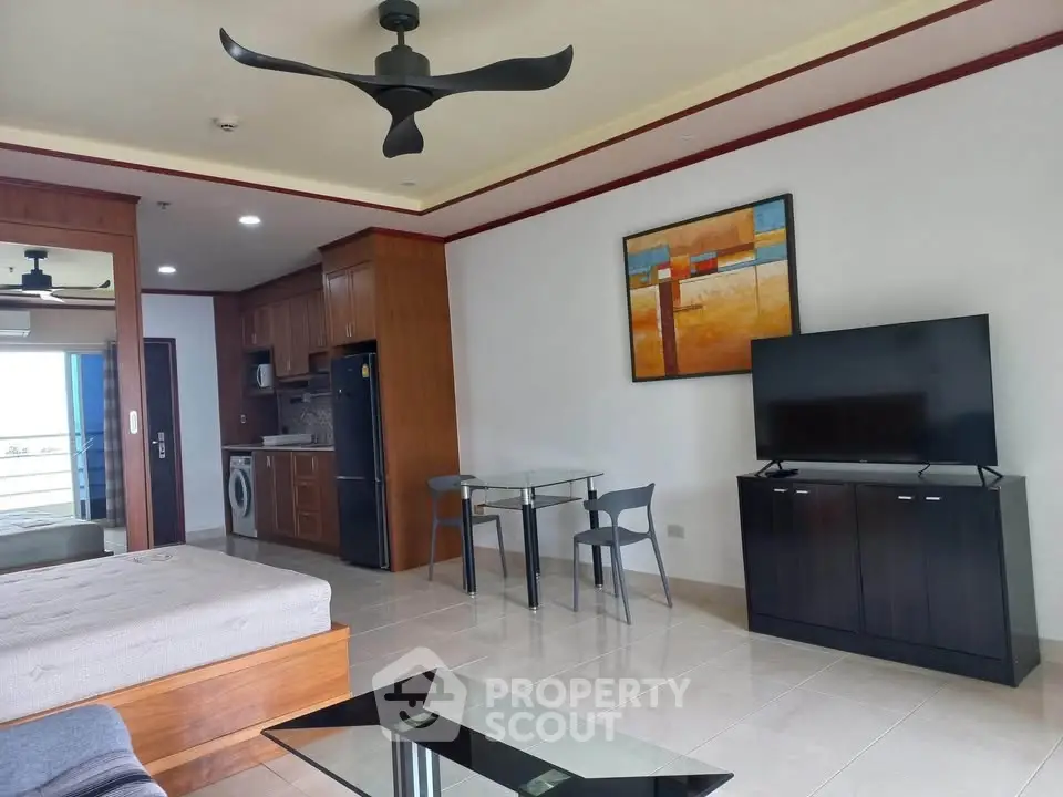 Modern living room with stylish decor, open layout, and sleek furniture in a contemporary apartment.