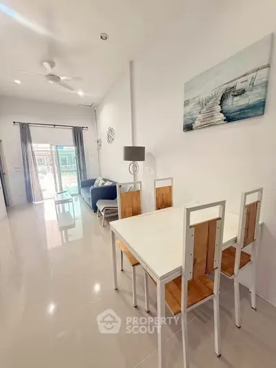 Spacious modern living room with sleek furniture and natural light