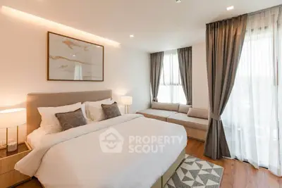 Luxurious bedroom with elegant decor and natural light