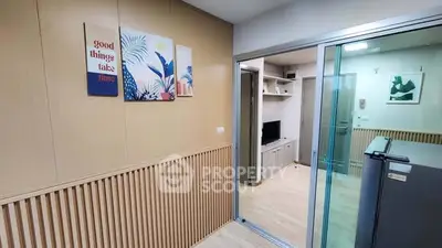 Modern apartment interior with sliding glass door and stylish decor