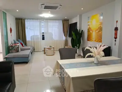 Spacious modern living room with elegant decor and natural light