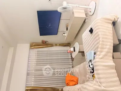 Cozy living room with modern decor and wall-mounted TV