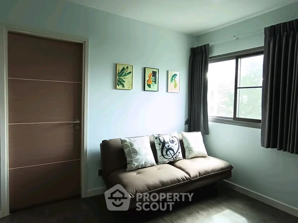 Cozy living room with modern sofa and decorative wall art