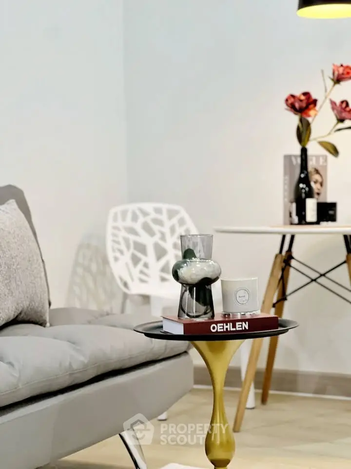 Stylish modern living room with elegant decor and cozy seating area.