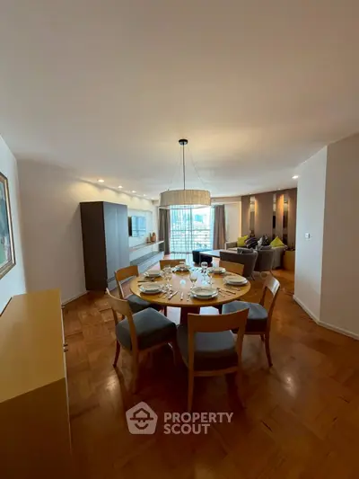 Spacious living room with elegant dining area and modern decor