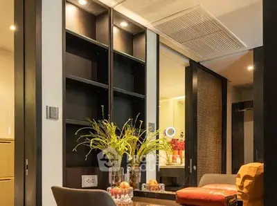 Modern interior with stylish shelving and elegant decor in a cozy living space.