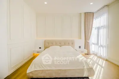 Luxurious bedroom with elegant design and natural light
