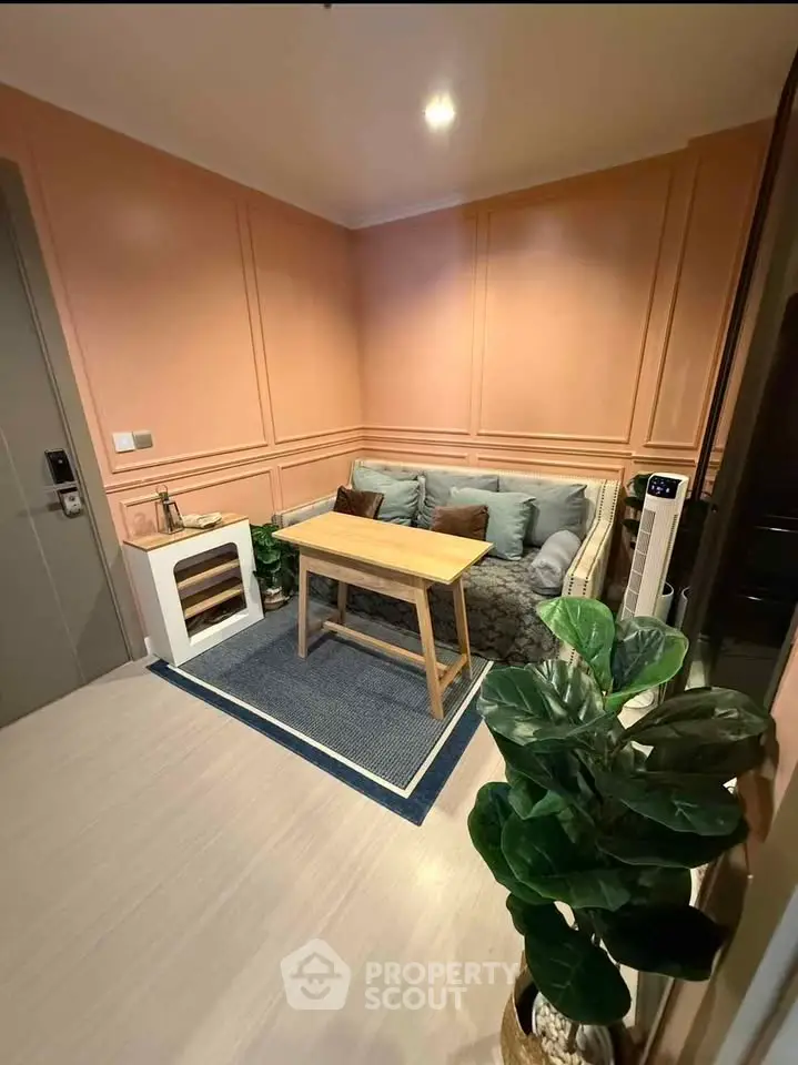 Cozy living room with stylish decor and comfortable seating in modern apartment.