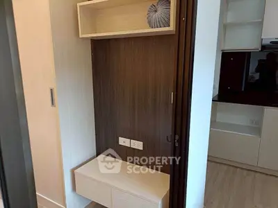 Modern interior with built-in storage and sleek kitchen design