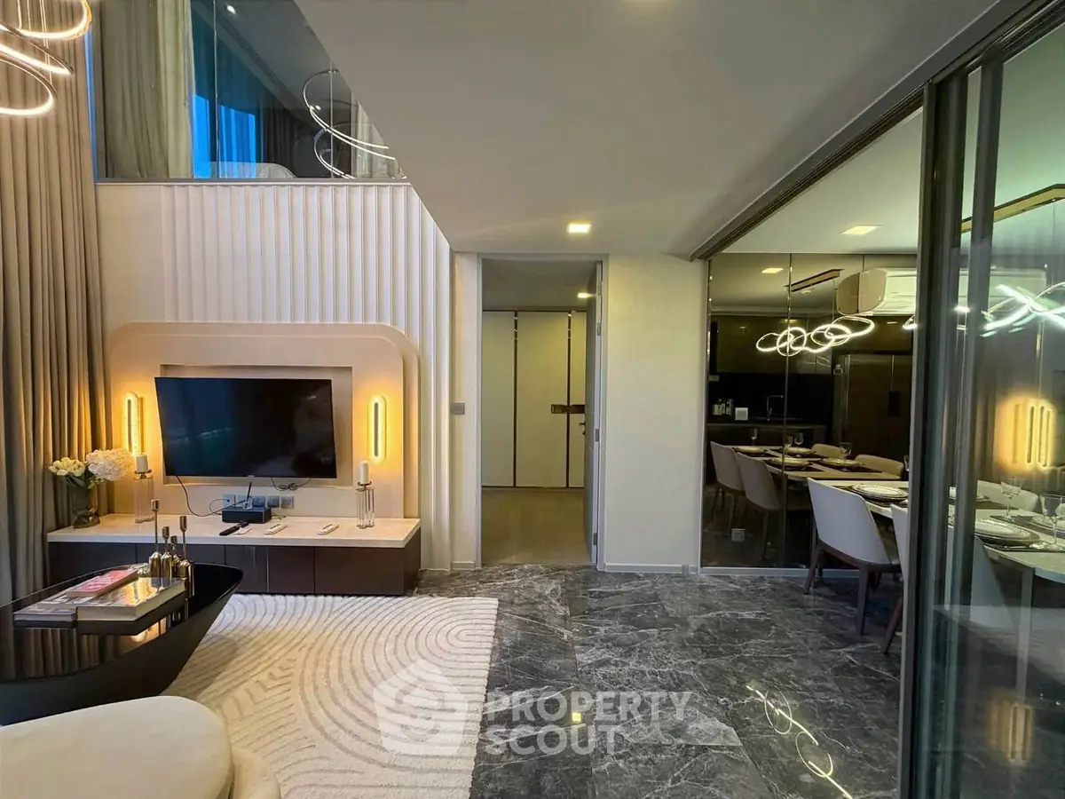 Luxurious modern living room with marble flooring and elegant dining area