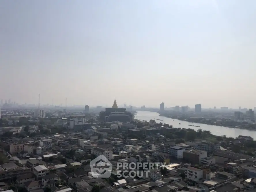 Stunning cityscape view with river and skyline, perfect for urban living enthusiasts.