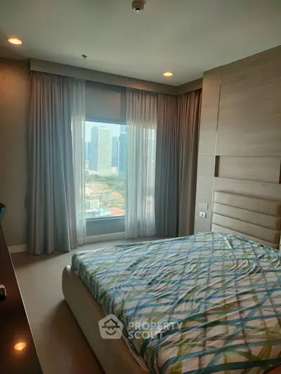 Modern bedroom with city view and stylish decor in urban apartment