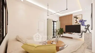 Modern living room with stylish decor, cozy seating, and elegant lighting in a contemporary home.