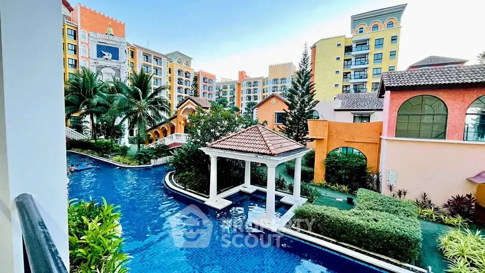 Stunning resort-style apartment complex with lush gardens and a sparkling pool view.