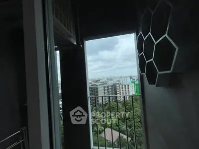 Stunning balcony view overlooking cityscape and greenery, ideal for urban living.