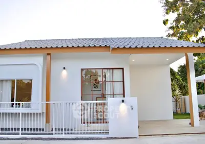 Charming modern white house with stylish roof and inviting entrance