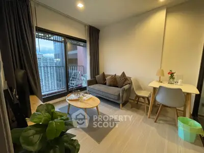 Cozy living room with modern decor and city view balcony
