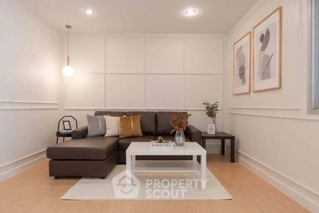 Stylish modern living room with cozy sectional sofa and chic decor