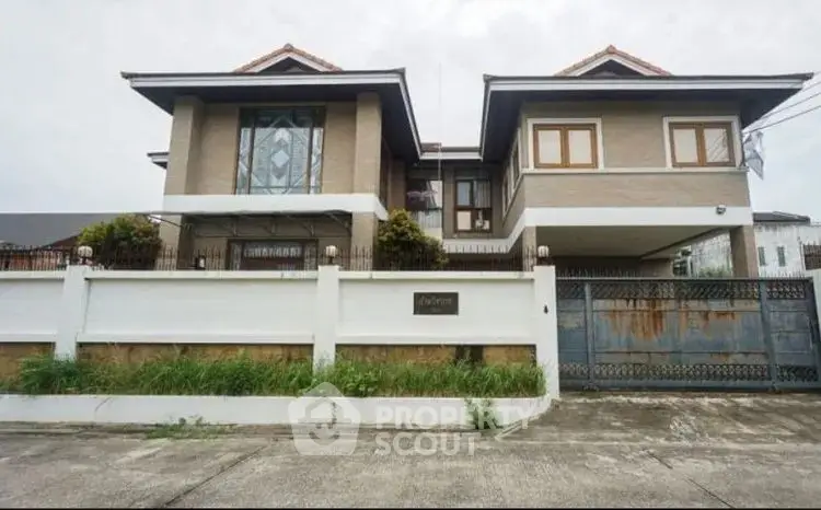 Stunning two-story house with modern design and spacious layout in a serene neighborhood.