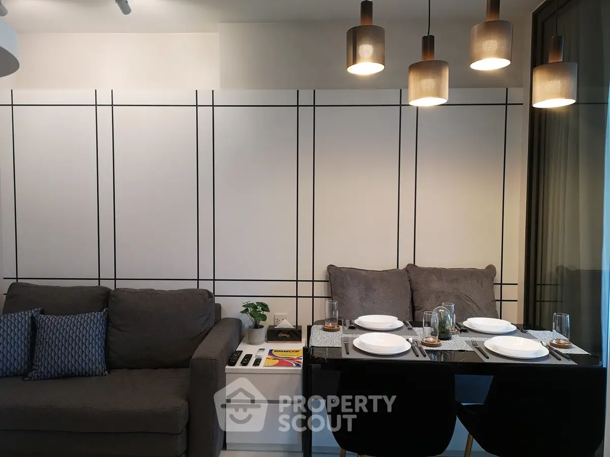 Modern living room with stylish dining area and cozy sofa