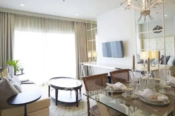 Elegant living room with modern decor and natural light