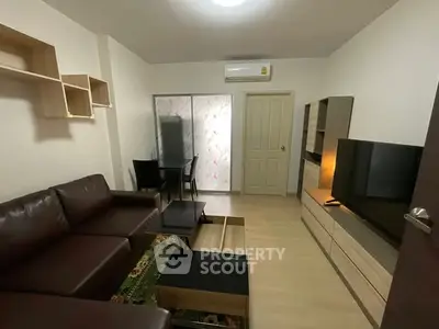 Modern living room with sleek furniture and wall-mounted shelves