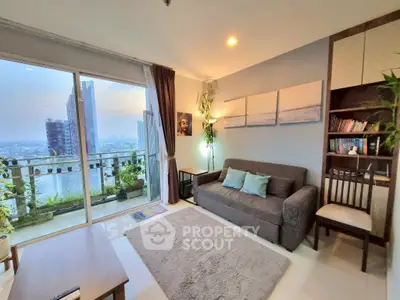 Stylish living room with city view and balcony access in modern apartment